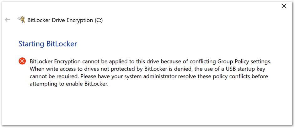 BitLocker Drive Encryption error when conflicting Group Policy settings are present.